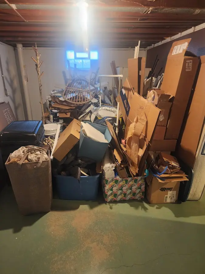 Roll-off dumpster container at job site for 2 Yard Dumpster Rental in Savannah